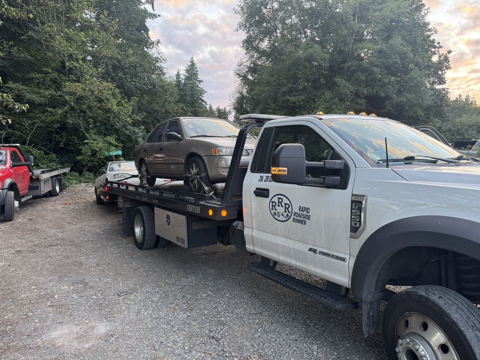 Sedan on a Rapid Roadside Runner flatbed